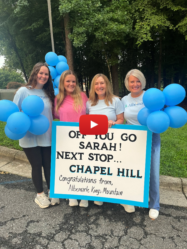 community affairs team cheers scholar as she leaves for college
